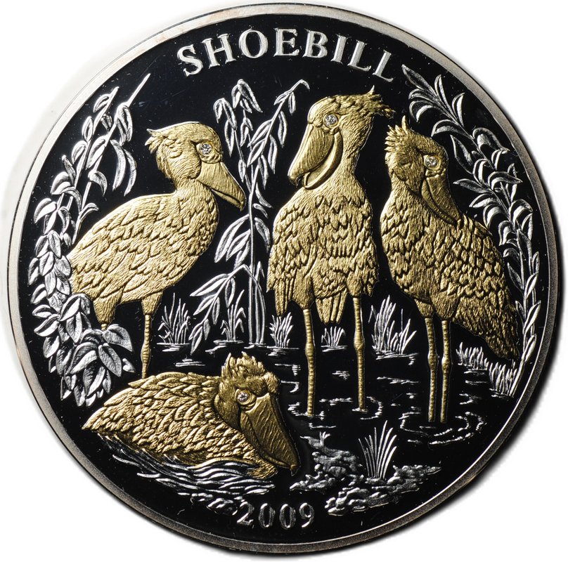 Монета 1000 франков 2009 Китоглав Королевская цапля Руанда